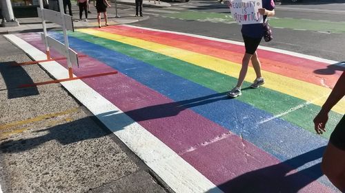 Woman walking on road