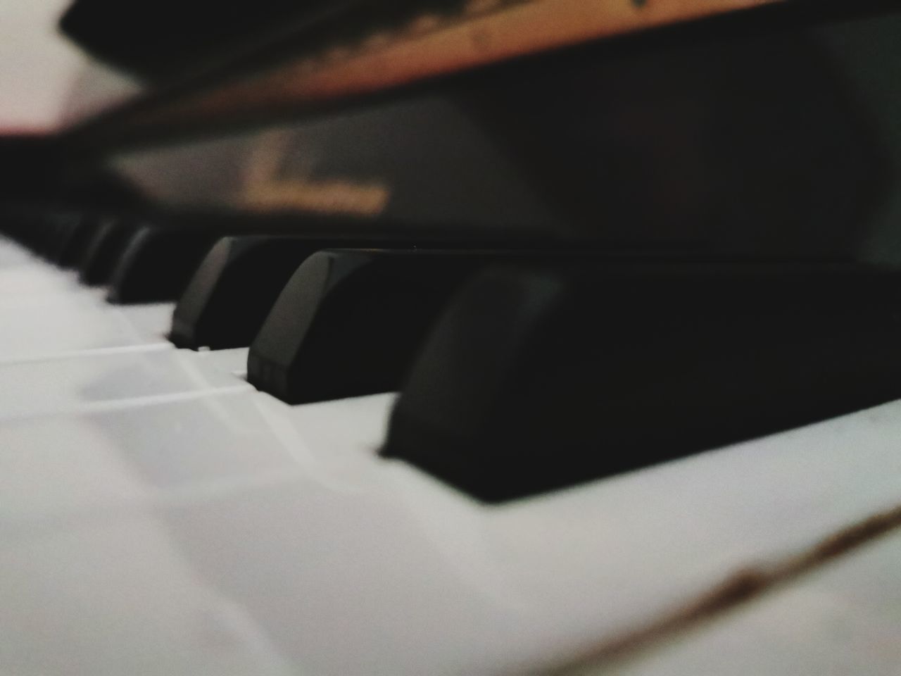CLOSE-UP OF PIANO