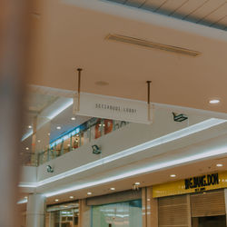 Low angle view of illuminated text on building