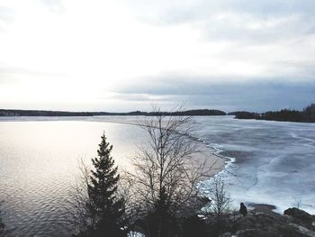 Scenic view of sea against cloudy sky