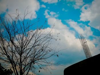 Low angle view of building against blue sky