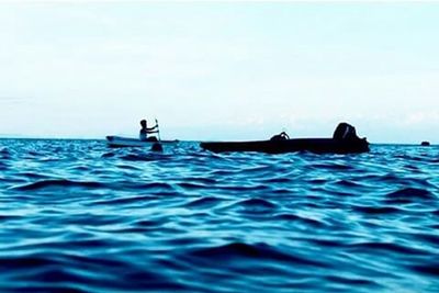 Boat sailing in sea