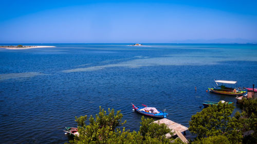 High angle view of sailboat moored in sea