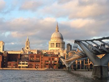 View of st. paul's cathedral with the millennium bridge and city of london school also visible