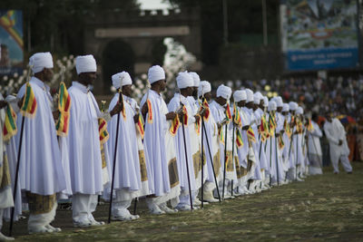 People standing in traditional clothing