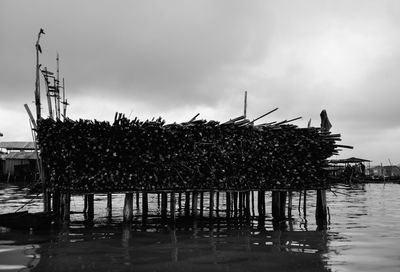 Pier on sea against sky