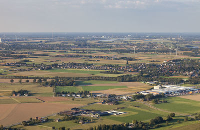 Aerial view of agricultural field against sky