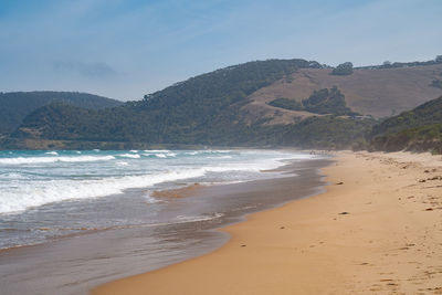 Scenic view of beach against sky