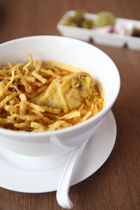 Close-up of noodles in bowl on table