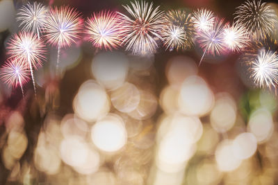 Defocused image of firework display at night