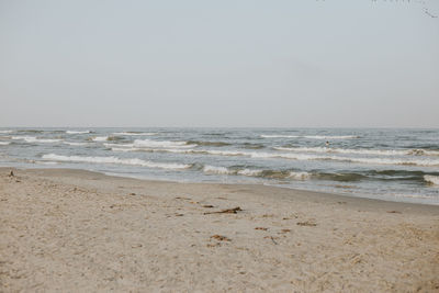 Scenic view of beach against clear sky