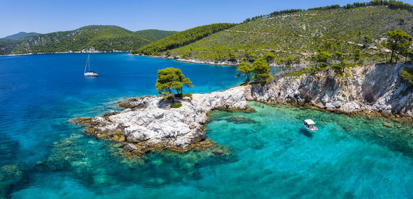 Scenic view of sea against mountain