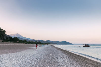 Scenic view of beach against clear sky