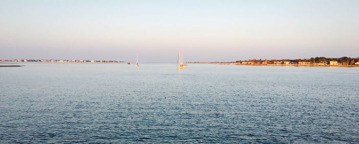 Scenic view of sea against clear sky