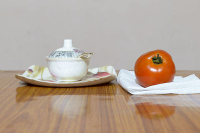 Fruits and tea on table