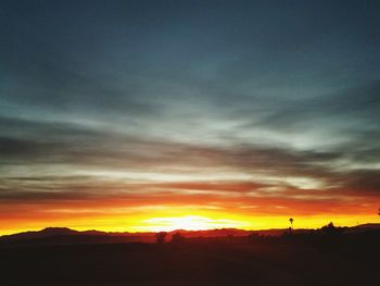 Scenic view of silhouette against sky during sunset