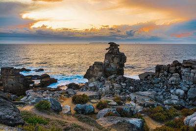 Scenic view of sea against sky during sunset