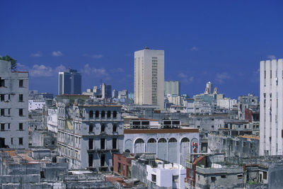 Buildings in city against sky