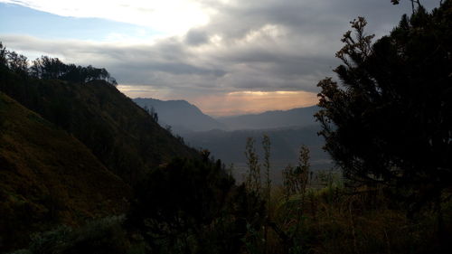 Scenic view of mountains against sky during sunset