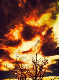 Low angle view of cloudy sky at sunset