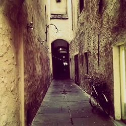 Narrow alley along buildings