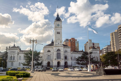 Buildings in city against sky