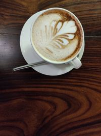 Coffee cup on table