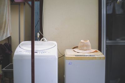 Close-up of washing machines at home