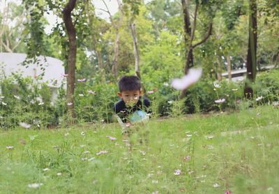 Full length of boy on field