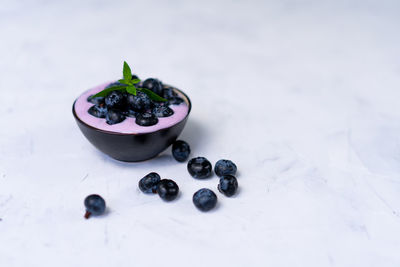 High angle view of fruits in plate on table