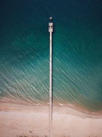 High angle view of pole on beach