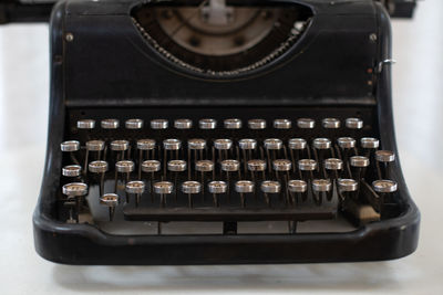 High angle view of old machine on table