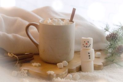 Close-up of coffee cup on table
