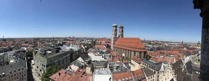 High angle view of townscape against clear blue sky