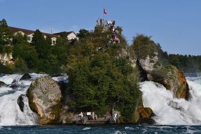 Scenic view of river against clear sky