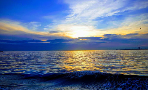 Scenic view of sea against sky during sunset