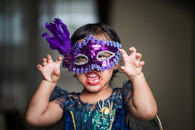 Portrait of cute girl in halloween costume.