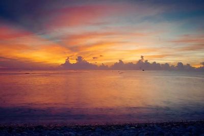 Scenic view of sea at sunset