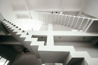 Low angle view of white concrete staircase of building