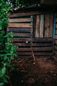 Close-up of old wooden structure in field