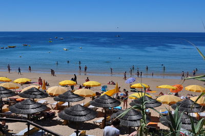 Scenic view of sea against clear blue sky