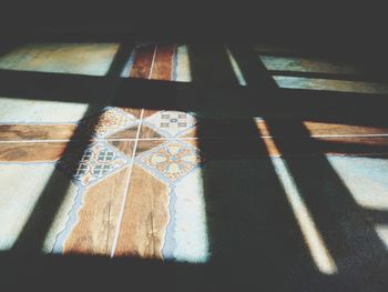 High angle view of shadow on table