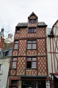 Low angle view of old building against sky