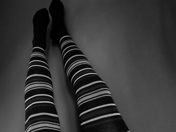 Low section of woman wearing socks