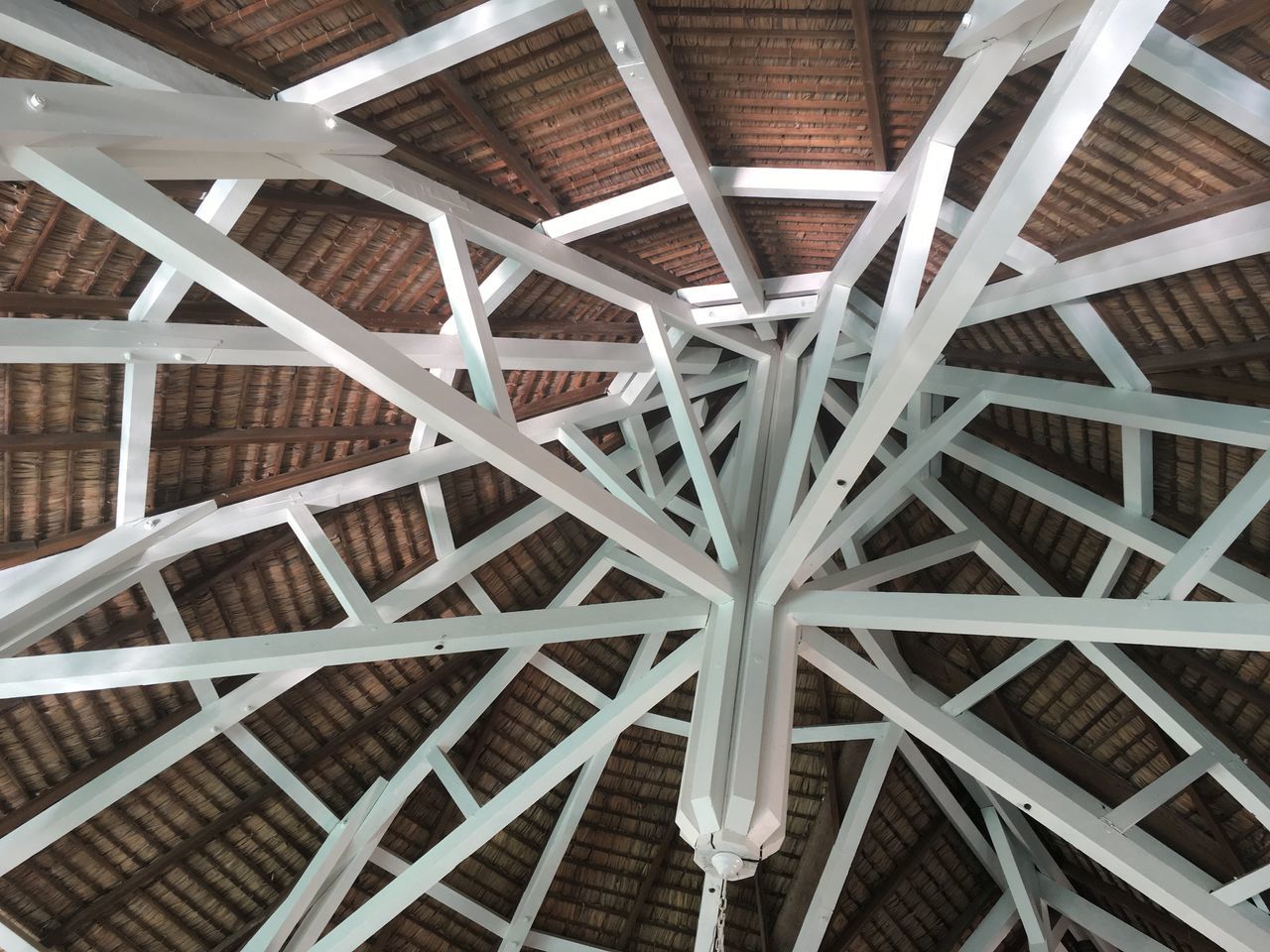 indoors, architecture, ceiling, no people, built structure, pattern, roof, low angle view, full frame, wood - material, roof beam, backgrounds, day, close-up, building, still life, design, white color, creativity, abundance