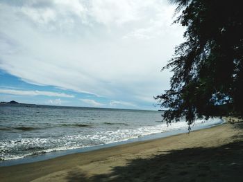 Scenic view of beach against sky