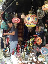 Multi colored lanterns for sale at market stall
