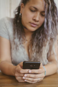 Young woman using mobile phone