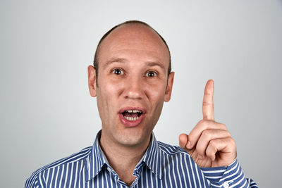 Portrait of man against white background