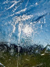 Close-up of water splashing in sea